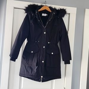Excellent Condition...Warm black winter jacket with removerable fur hood!